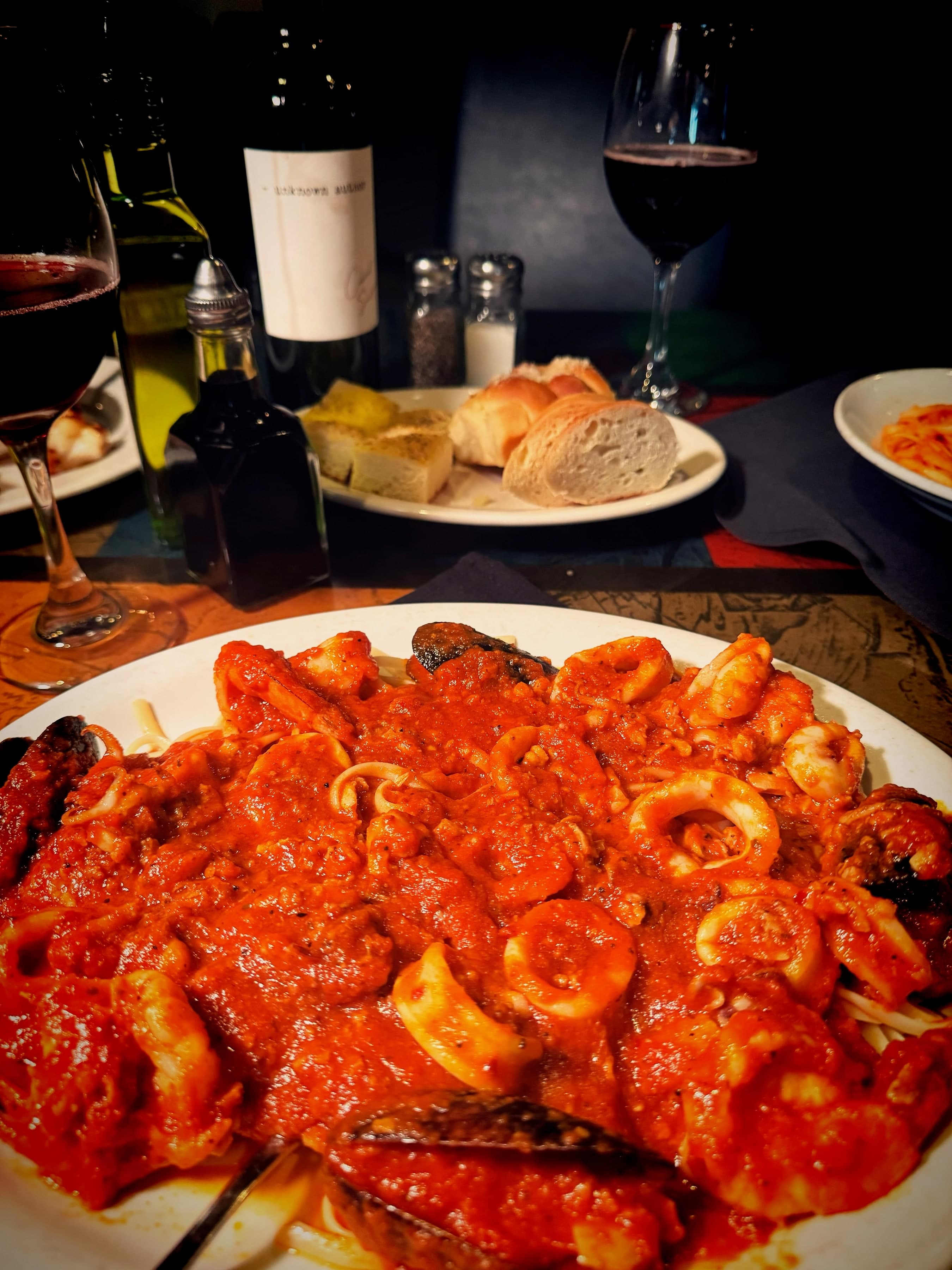 Italian family feast at Nick's Italian, featuring holiday-inspired dishes.