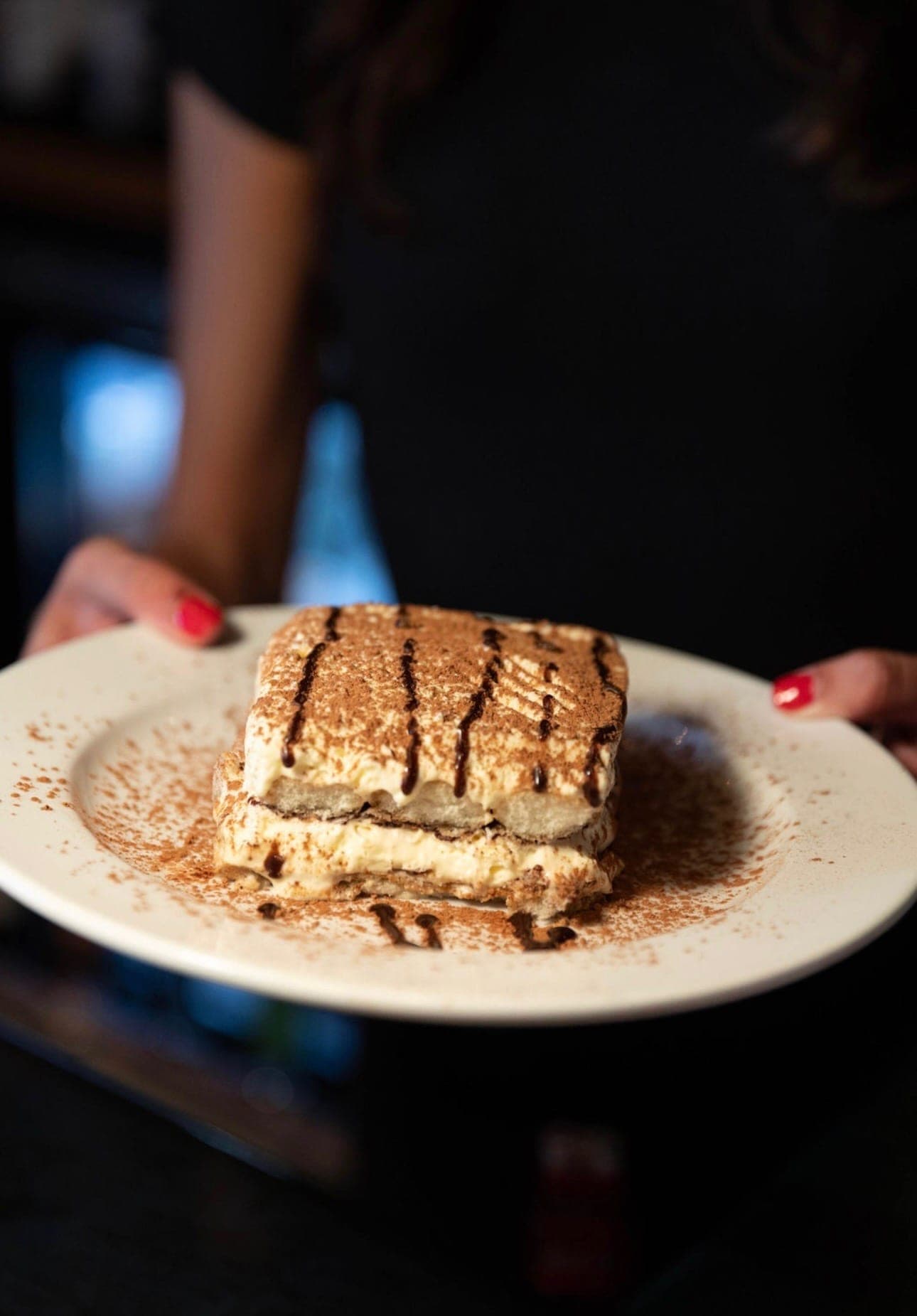 Homemade tiramisu dusted with cocoa at Nick's.